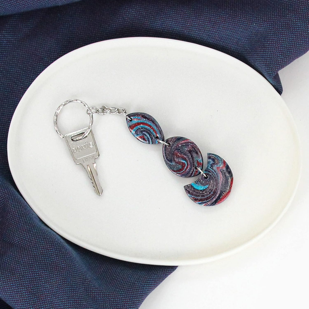Galaxy-Marmorkunst Schlüsselanhänger aus gemixter FIMO Clay mit Glitzeranteil