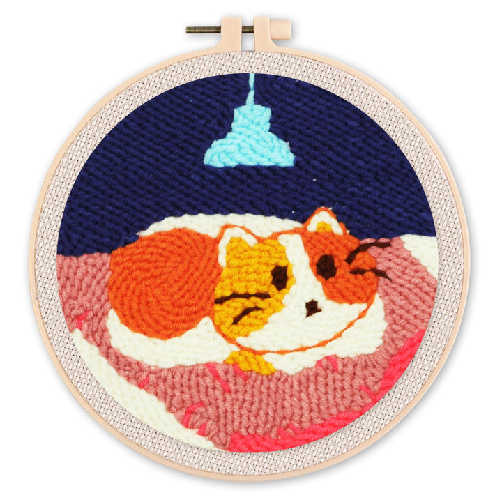 Punch Needle 20x20 Eine Katze in ihrem Bett