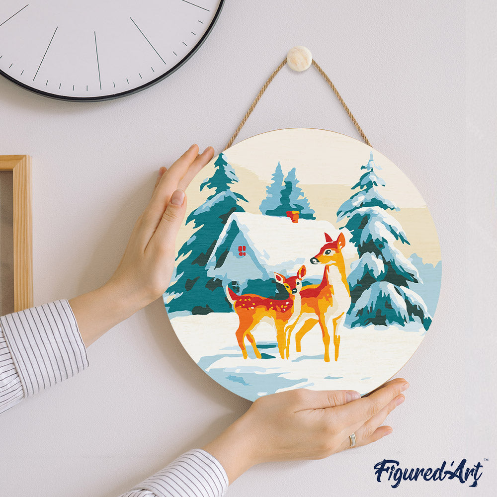 Malen nach Zahlen auf Holzscheibe – Rehe und Hütte