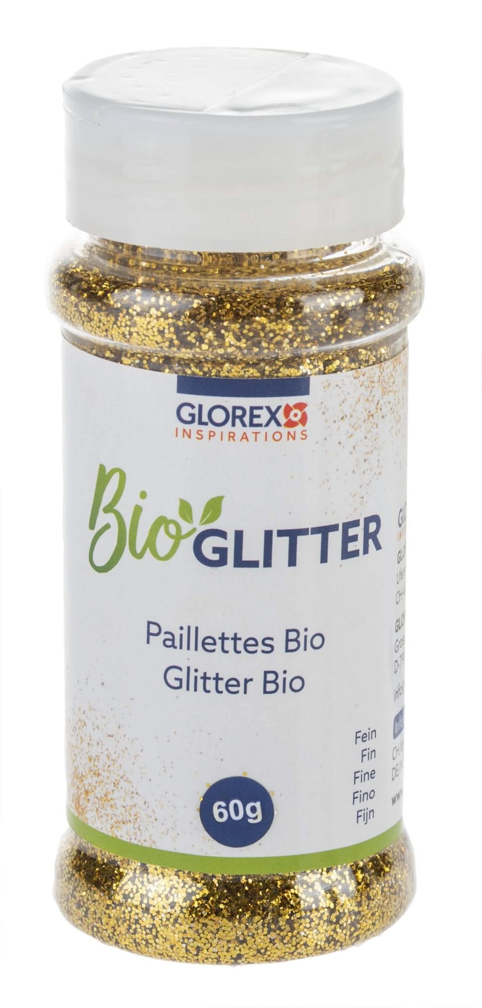 Paillettes bio Glorex 60g dans un pot transparent avec couvercle blanc et graphique feuille verte