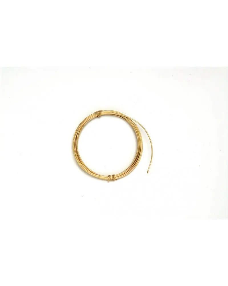 Filo decorativo dorato 1 mm, avvolto su sfondo bianco