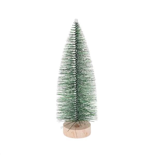 Piccolo abete di Natale verde con neve artificiale e base in legno naturale